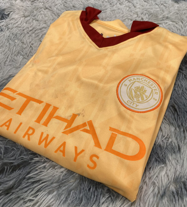 Bộ áo bóng đá Man city – Mc sân khách cam Super hàng thailand 2023-2024 Giống thi đấu 99% thêu